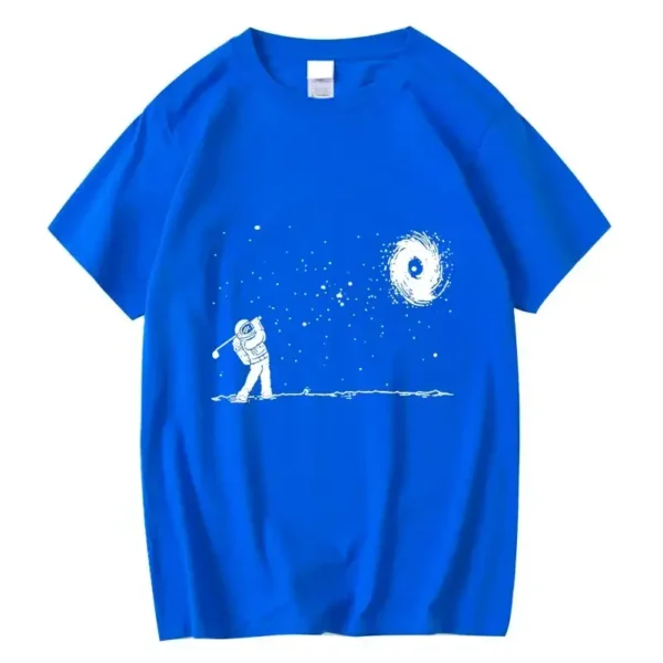 Astronaut and galaxy print T-shirt in vibrant blue, featuring a white illustration of an astronaut reaching towards a swirling galaxy in space. Perfect for science enthusiasts and space lovers.