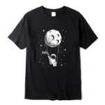 Black T-shirt featuring a playful astronaut swinging from the moon with stars, perfect for science lovers and space enthusiasts.