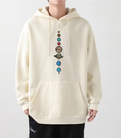 Cozy cream hoodie featuring a colorful solar system design with planets and stars, perfect for science enthusiasts and casual wear.