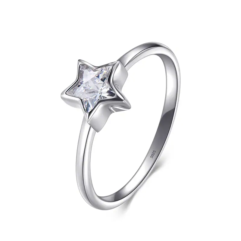 Star-shaped Silver Ring with Crystal Center Elegant silver ring featuring a star-shaped design with a sparkling crystal center, perfect for jewelry enthusiasts and gift-givers.