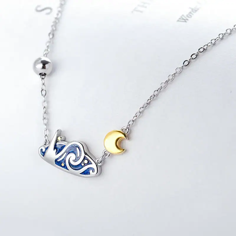 Elegant necklace featuring a starry night design with a crescent moon pendant, perfect for science and astronomy enthusiasts.