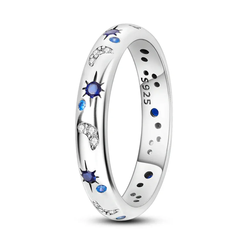 Astronomy-themed silver ring with blue and crystal accents.
