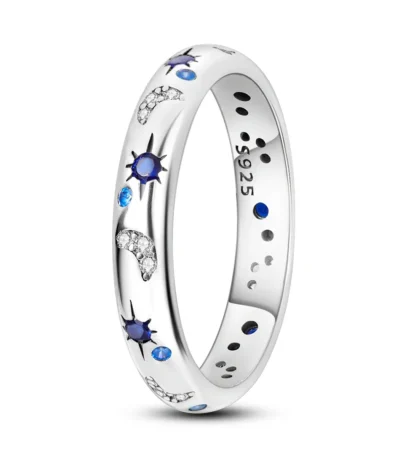 Astronomy-themed silver ring with blue and crystal accents.