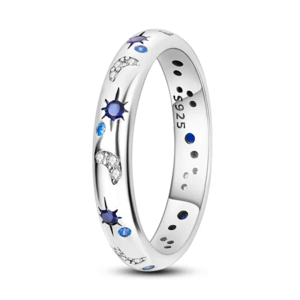 Astronomy-themed silver ring with blue and crystal accents.