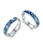 Elegant silver rings with blue enamel featuring celestial zodiac designs, perfect for astrology enthusiasts and jewelry lovers.