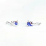 Small silver earrings featuring colorful swirling wave design, perfect for ocean lovers and fashion enthusiasts.