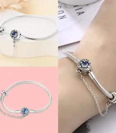 Elegant silver bracelet featuring a celestial starry night charm with blue and white accents, perfect for jewelry and fashion accessories.