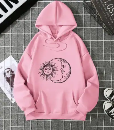Pink hoodie featuring a sun and moon graphic, perfect for teens and adults, casual wear, and cozy style.