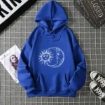 Bright blue hoodie featuring a celestial sun and moon design, perfect for science enthusiasts and educational decor.