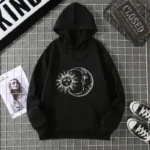 Black hoodie featuring a detailed sun and moon graphic design, perfect for science lovers and casual wear.