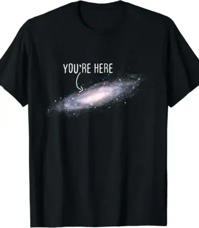 Galaxy T-Shirt with "You're Here" Text - Space-themed casual wear featuring a galaxy illustration and humorous message. Perfect for science and space enthusiasts.