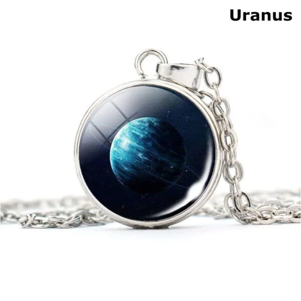 Close-up of a silver pendant necklace featuring a detailed image of the planet Uranus, perfect for science enthusiasts and astronomy lovers.