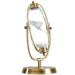 Elegant hourglass with a gold frame and white sand, perfect for science decor and educational displays.