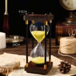 Elegant sand timer with wooden frame and yellow sand, perfect for educational and decorative purposes.