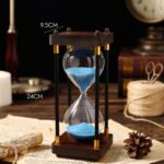 Classic hourglass timer with blue sand, measuring 24cm in height and 9.5cm in width, ideal for educational science demonstrations and timing activities.