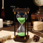 Sand timer with green sand, measuring 24cm in height and 9.5cm in width, ideal for science decor and educational purposes.