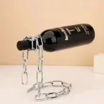 Creative science-themed bottle holder made from a chain and a bottle, perfect for educational displays or modern science decor.
