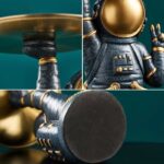 Close-up of a steampunk-style robot figurine with metallic details, showcasing its hand, head, and intricate design elements, perfect for science-themed decor and educational toys.