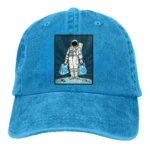 Blue baseball cap featuring a detailed astronaut illustration holding two science-themed bags, perfect for space enthusiasts and educational purposes.
