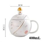 Astronaut mug with lid, galaxy design, 400ml capacity, ideal for science enthusiasts and space fans.