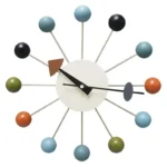 A stylish atomic-themed wall clock featuring colorful spheres representing electrons orbiting a central white clock face, ideal for science enthusiasts and educational spaces.