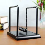 Newton's Cradle - Classic Physics Demonstration Toy for Education and Office Decor.