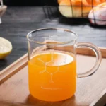 Chemical Structure Glass Mug with Orange Juice.