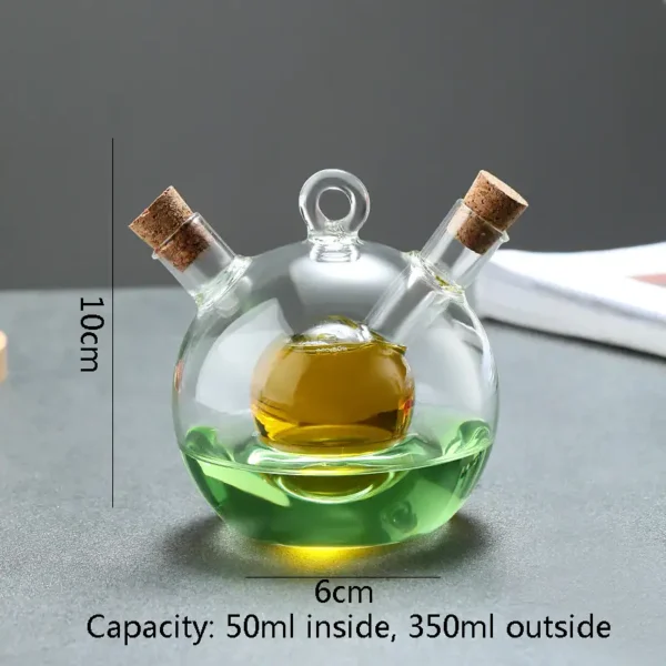 Small glass chemistry flask with three necks, filled with yellow and green liquids, featuring cork stoppers, on a gray background.