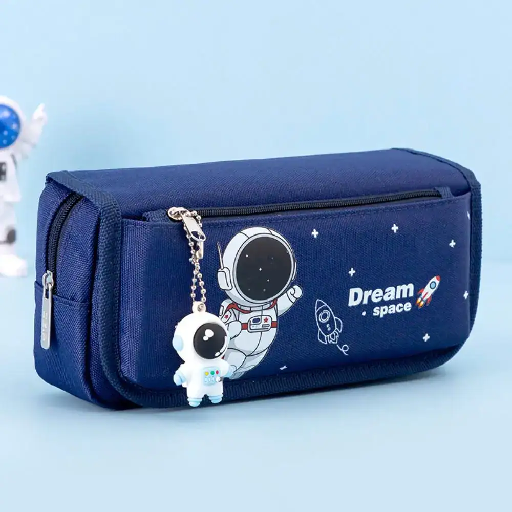 Space-themed pencil case featuring an astronaut and rocket illustrations, with a keychain of a cute astronaut figure attached. Perfect for students and space enthusiasts.