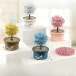 Colorful crystal trees in pots, educational toys for children, featuring yellow, blue, pink, and white crystals, perfect for science decor and learning activities.