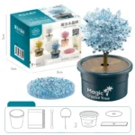 Educational crystal growing science kit for children, featuring a magic crystal tree in a pot, with colorful crystal formations and accessories for hands-on learning.