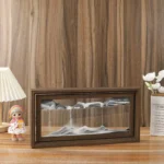 Elegant vintage wooden display box with glass front showcasing layered wave-like formations, perfect for science-themed decor or educational displays.