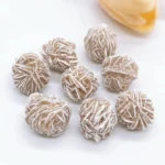 Delicious frozen dessert balls coated with shredded coconut, perfect for a sweet treat or educational activity about food science.