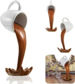 White coffee mug fountain with flowing brown liquid, designed as a decorative science-themed tabletop ornament.