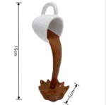 White ceramic mug with a handle, designed to look like it is pouring coffee into a splash-shaped base, demonstrating fluid dynamics and creative design.