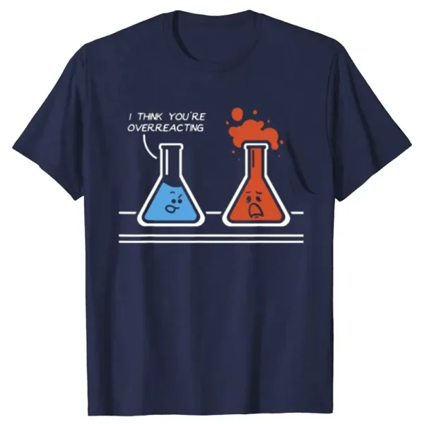 A humorous graphic T-shirt featuring two cartoon laboratory flasks with faces, one blue and one red, with the blue flask saying "I think you're overreacting" as the red flask bubbles over.