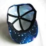 A space-themed cap featuring a galaxy print with LED lights on the brim, perfect for science enthusiasts and educational settings.
