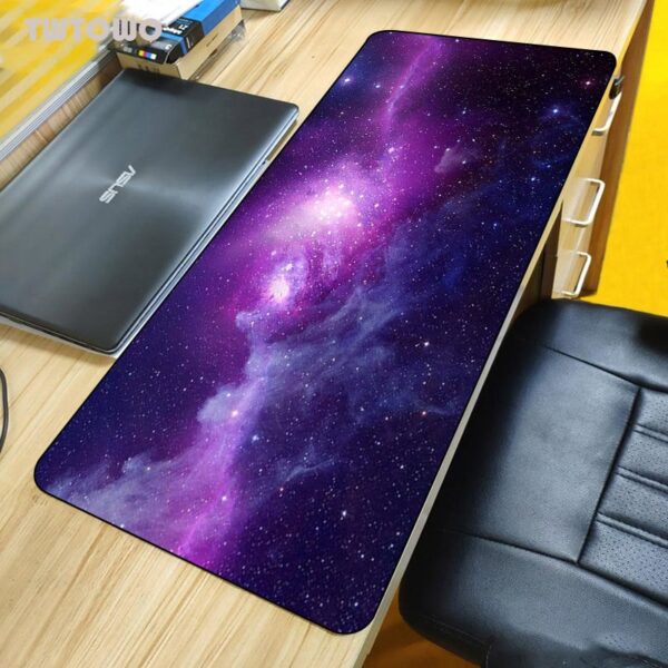 Galaxy-themed desk mat with vibrant purple and pink nebula design.