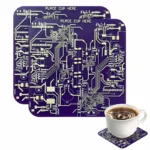 Set of circuit board-themed coasters with a coffee cup on one, showcasing a tech-inspired design perfect for science and electronics enthusiasts.