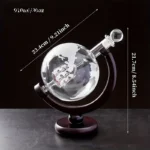 Glass globe with a detailed skeleton model inside, perfect for science decor and educational purposes.