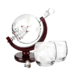Decorative globe with a ship inside a glass bottle, mounted on a wooden stand, ideal for science decor and educational purposes.