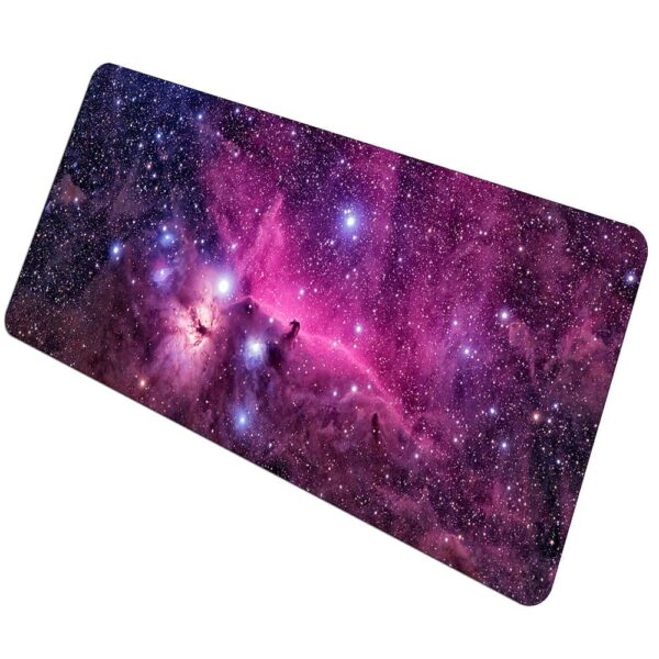 Vibrant galaxy-themed desk mat featuring a stunning nebula with bright stars in shades of pink, purple, and blue, perfect for science enthusiasts and space lovers.