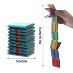 Stack of colorful foam building blocks held by a hand, demonstrating their flexibility and stacking ability, ideal for educational and creative play.