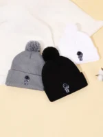 Warm knit beanies with astronaut embroidery, available in gray, black, and white. Perfect for science-themed fashion and educational gift ideas.