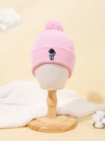 Pink astronaut beanie hat with pom-pom for children, featuring a cute space explorer embroidery, ideal for science-inspired accessories and educational toys.