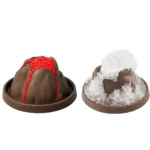 Delicious chocolate lava cake with red syrup drizzle and powdered sugar topping, perfect for dessert lovers and science-themed decor.