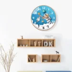 Astronaut-themed wall clock with space and rocket design, perfect for kids' rooms and science enthusiasts.