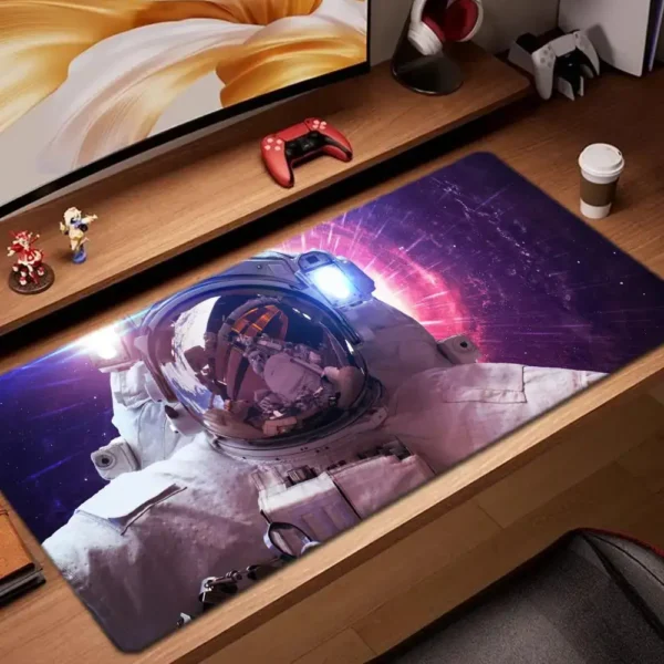 High-quality space astronaut desk mat featuring a vibrant cosmic background and astronaut illustration, perfect for gaming, studying, or working.