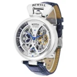 Elegant skeleton automatic watch with visible gears and blue hands, featuring a leather strap and intricate mechanical design.
