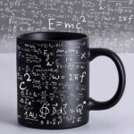 Black ceramic mug featuring white scientific formulas and equations, perfect for science enthusiasts and students.